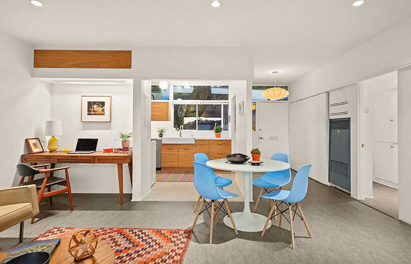 View of the dining area and kitchen.