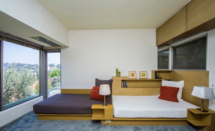 Bedroom with a wide outside view