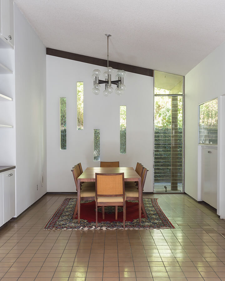 The dining room and table of Mid Century Modern Fixer in Beverly Hills 