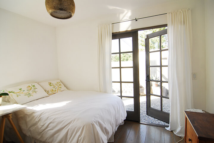 The bedroom and a glass door