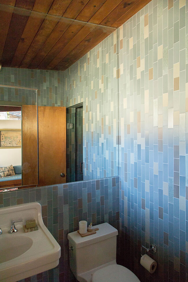 Bathroom with blue-coloured brick tiles