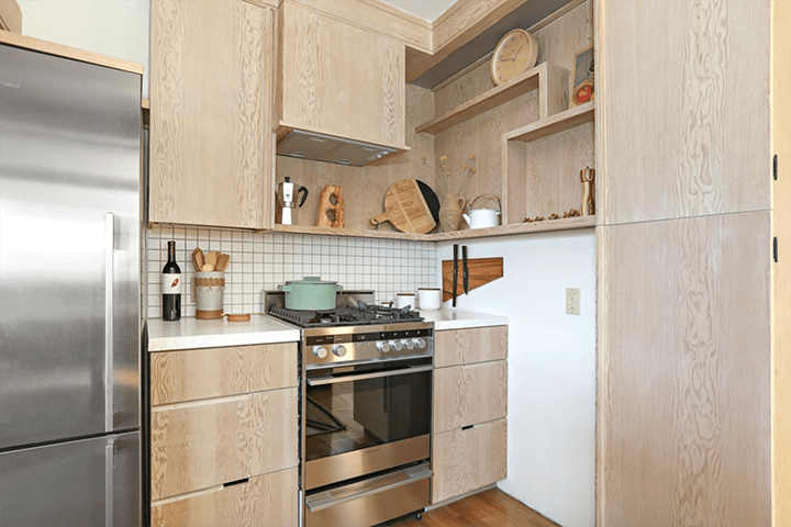 The kitchen and wooden shelf