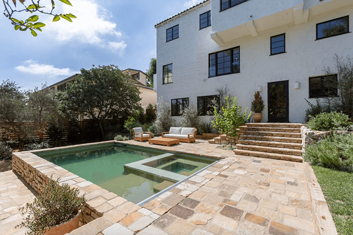 The pool of Frankie Faulkner designed Spanish Colonial Revival style home