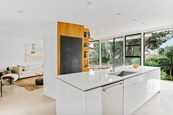 The kitchen basin of Franklin Hills Midcentury remodeled by architect Linda Taalman
