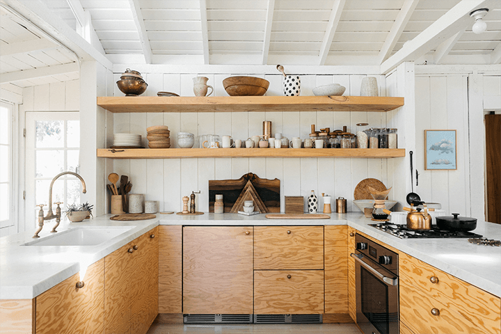 The kitchen, wooden shelf, and cabinet