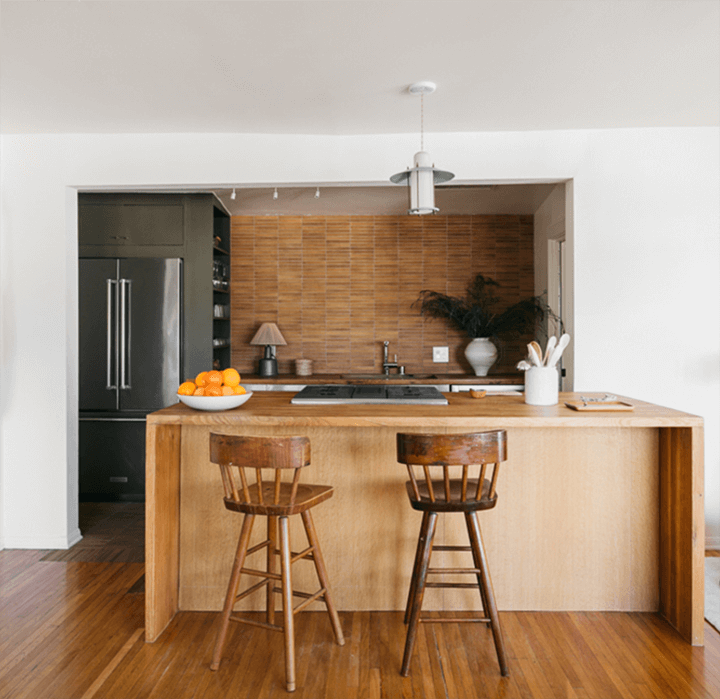 The kitchen and wooden stools