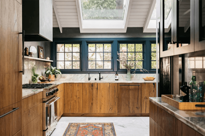 The kitchen has a wooden cabinet and a glass ceiling