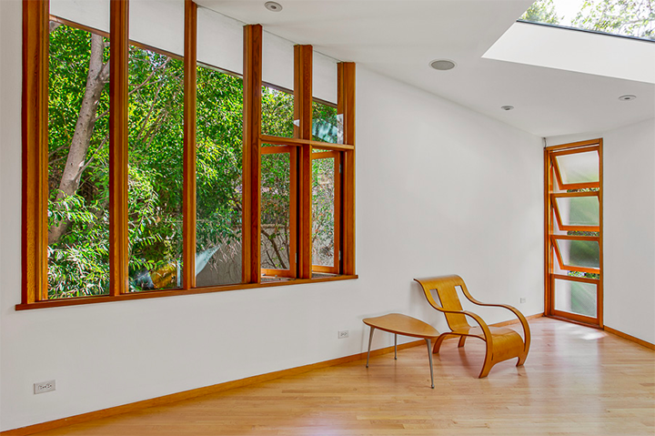 Wooden floor and wooden frame glass windows