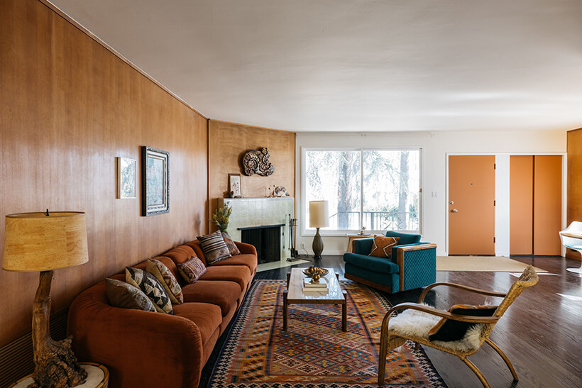 Inside a mid century modern home located on Townsend, north of Colorado Blvd. Original wood-panels line the walls. Dark hardwood floors run throughout.