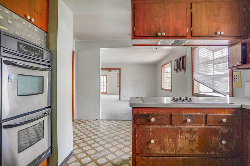 The kitchen Van Nuys Fixer in a Bidding War with square-shaped tiles