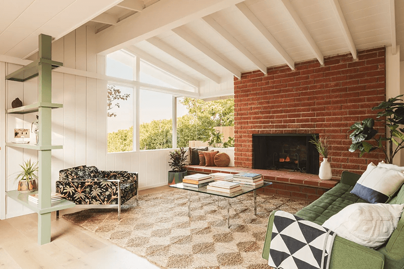 The living room and a fireplace of the Modern Residence Studio City